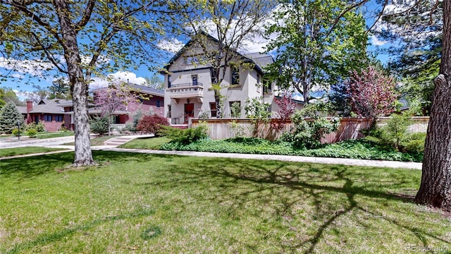 view of front of property with a front lawn