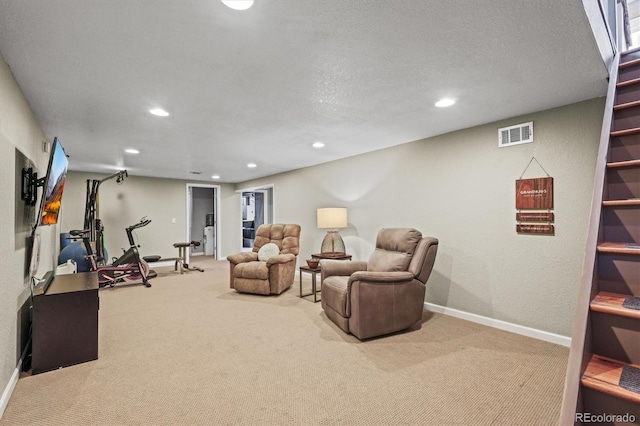 interior space featuring recessed lighting, visible vents, and carpet floors