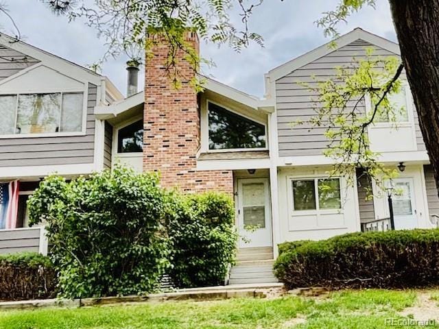 6895 W 84th Way Unit 4, Arvada, CO 80003 - back of property featuring a chimney