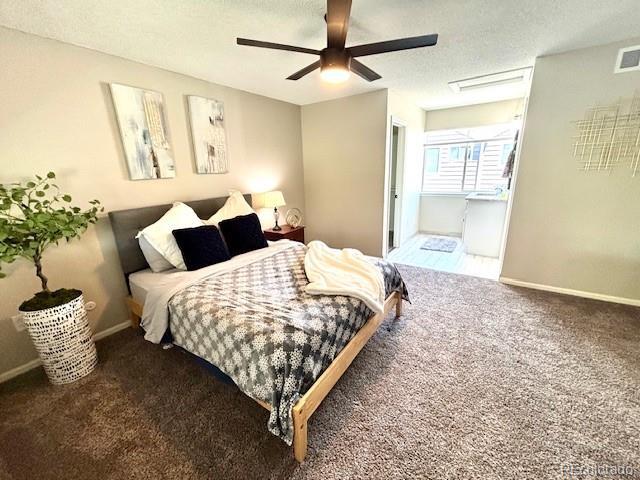 6895 W 84th Way Unit 4, Arvada, CO 80003 - bedroom with carpet, a ceiling fan, and baseboards