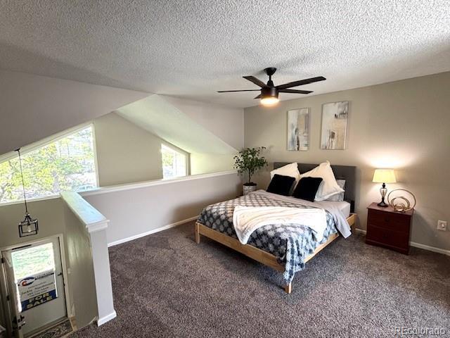 6895 W 84th Way Unit 4, Arvada, CO 80003 - bedroom featuring carpet flooring, a textured ceiling, a ceiling fan, and baseboards