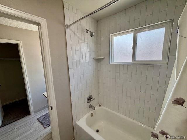 6895 W 84th Way Unit 4, Arvada, CO 80003 - full bathroom featuring shower / bathtub combination with curtain and wood finished floors