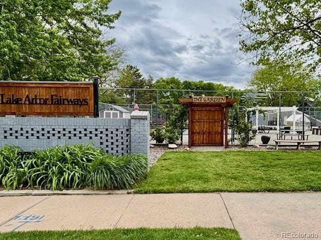 6895 W 84th Way Unit 4, Arvada, CO 80003 - community / neighborhood sign featuring a lawn