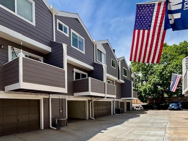 6895 W 84th Way Unit 4, Arvada, CO 80003 - view of property featuring a garage