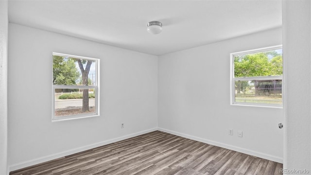 28571/2 Teller Ave, Grand Junction, CO 81501 - spare room featuring plenty of natural light and wood finished floors
