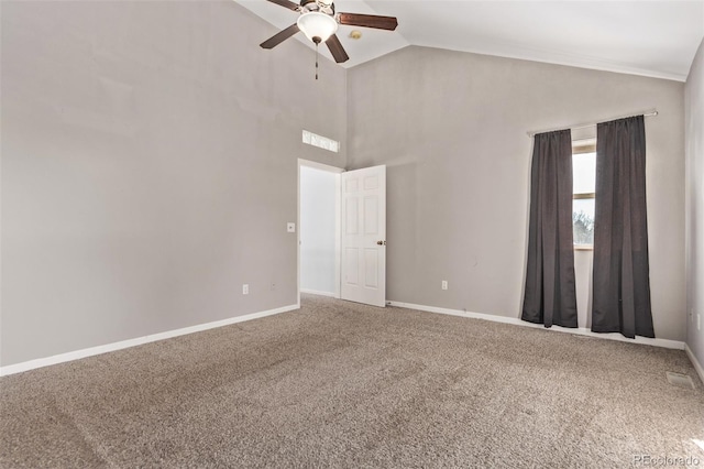 unfurnished room with carpet floors, high vaulted ceiling, and ceiling fan