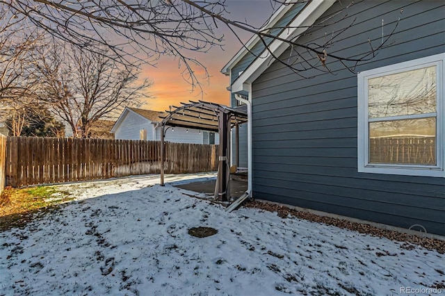 view of yard layered in snow