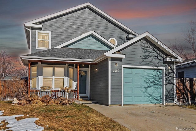 craftsman house featuring a porch and a garage