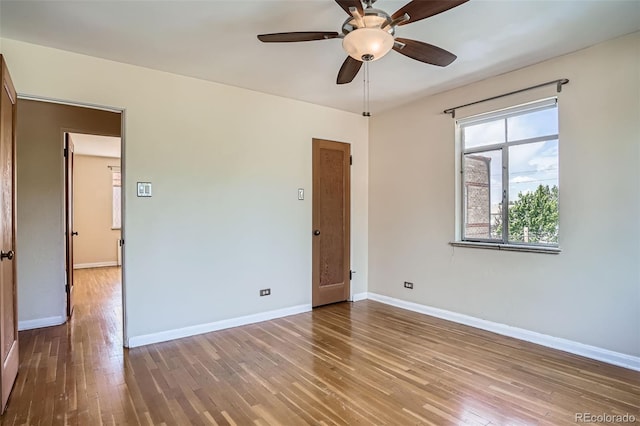 1523 Ivy St Unit 6, Denver, CO 80220 - unfurnished bedroom with wood-type flooring and ceiling fan
