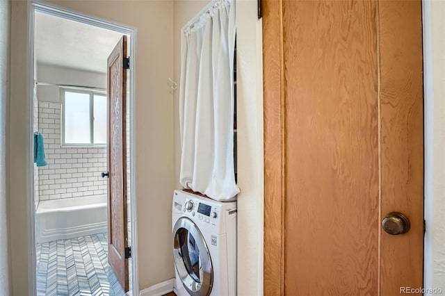 1523 Ivy St Unit 6, Denver, CO 80220 - laundry room with baseboards
