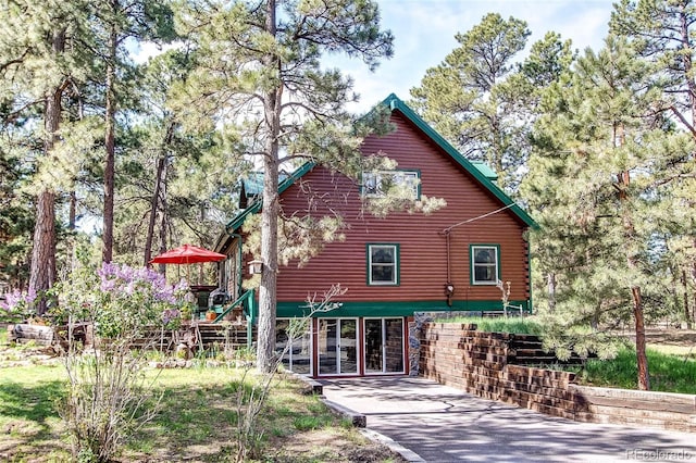 5030 Cedar Way, Elizabeth, CO 80107 - rear view of house featuring log exterior