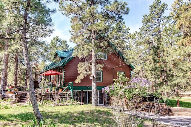 5030 Cedar Way, Elizabeth, CO 80107 - view of side of property with a wooden deck
