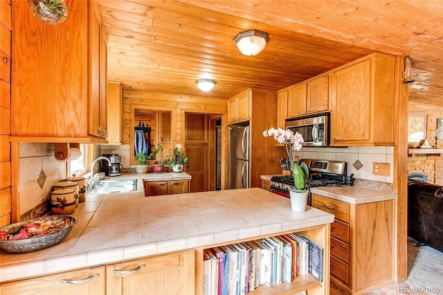 5030 Cedar Way, Elizabeth, CO 80107 - kitchen with stainless steel appliances, a sink, wood ceiling, tile countertops, and tasteful backsplash