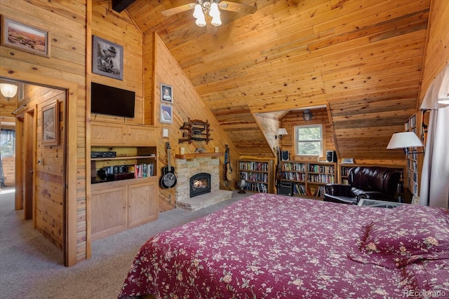 5030 Cedar Way, Elizabeth, CO 80107 - carpeted bedroom with wood walls, wooden ceiling, a stone fireplace, beamed ceiling, and high vaulted ceiling