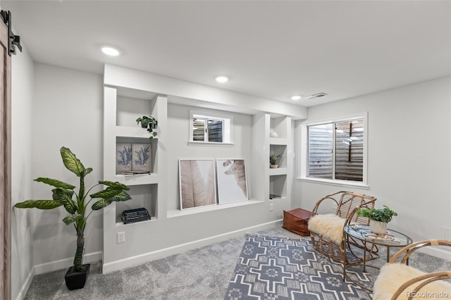 living area with carpet, visible vents, baseboards, and recessed lighting