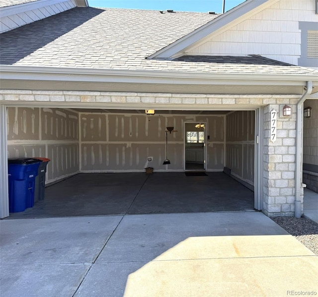 garage featuring driveway