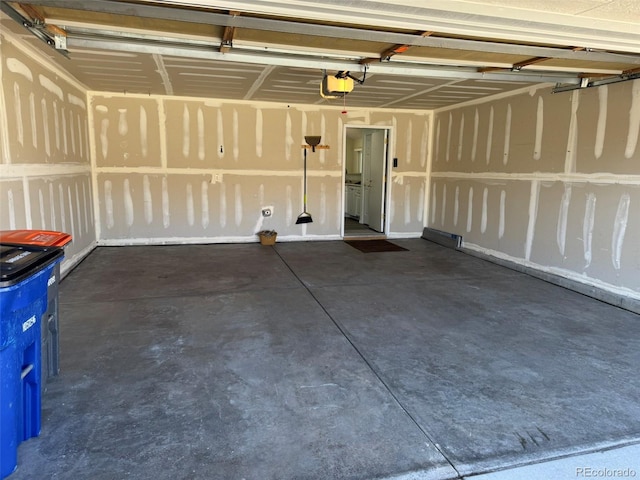 garage featuring a garage door opener