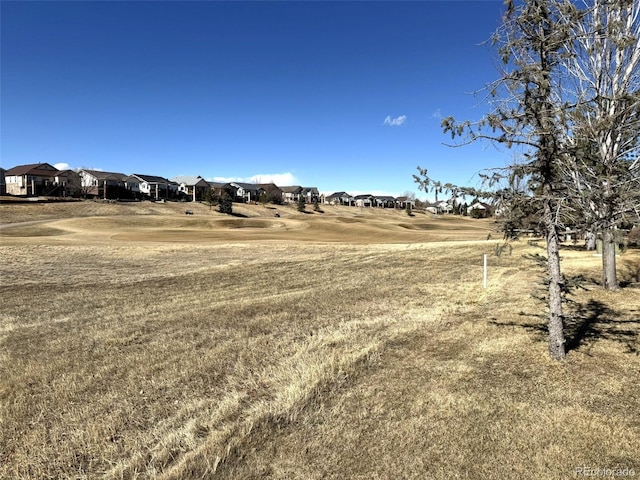 view of yard featuring a residential view