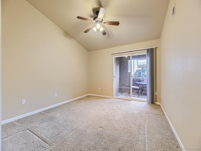 carpeted spare room featuring ceiling fan and lofted ceiling