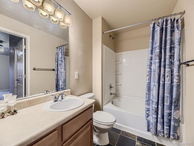 full bathroom featuring toilet, vanity, and shower / bathtub combination with curtain