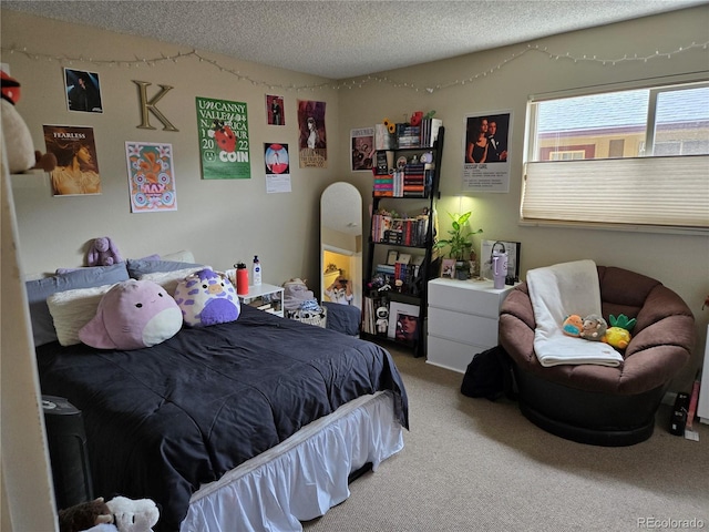 carpeted bedroom with a textured ceiling