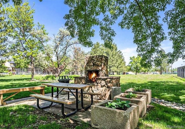 view of property's community with a lawn