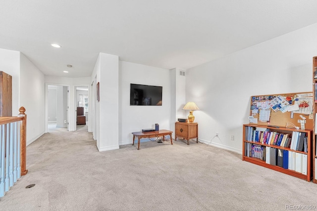 8943 Tappy Toorie Cir, Highlands Ranch, CO 80129 - living area with light carpet, baseboards, and recessed lighting
