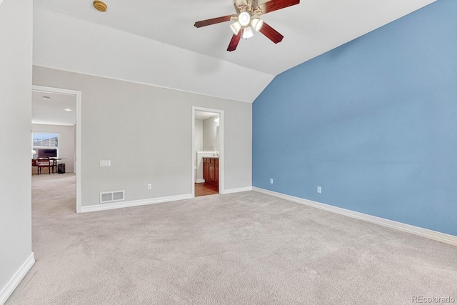 8943 Tappy Toorie Cir, Highlands Ranch, CO 80129 - unfurnished bedroom featuring carpet, baseboards, vaulted ceiling, and ceiling fan