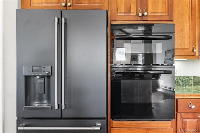 378 Fox Acres Dr W, Red Feather Lakes, CO 80545 - kitchen with refrigerator with ice dispenser and brown cabinetry