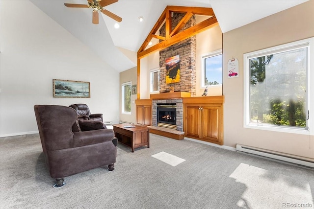 378 Fox Acres Dr W, Red Feather Lakes, CO 80545 - living area featuring baseboard heating, light carpet, high vaulted ceiling, a fireplace, and a ceiling fan
