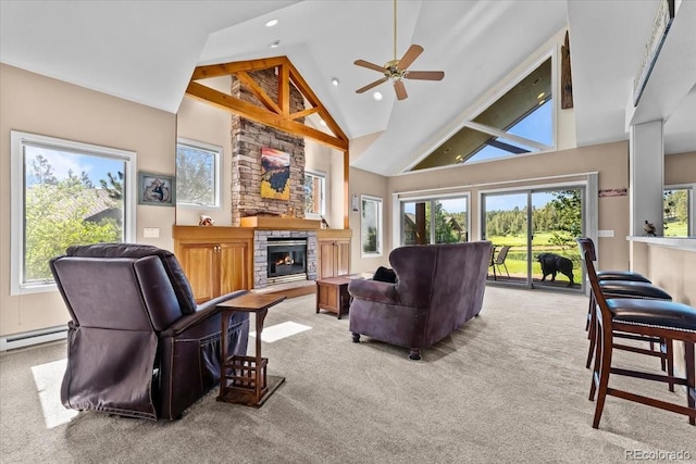 378 Fox Acres Dr W, Red Feather Lakes, CO 80545 - living area featuring light carpet, a stone fireplace, high vaulted ceiling, a ceiling fan, and recessed lighting