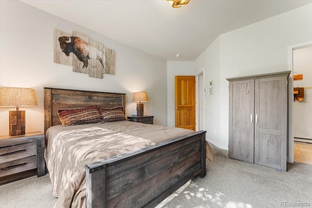 378 Fox Acres Dr W, Red Feather Lakes, CO 80545 - bedroom featuring light colored carpet and baseboard heating