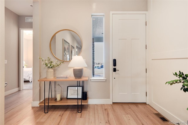 foyer entrance featuring light wood-type flooring