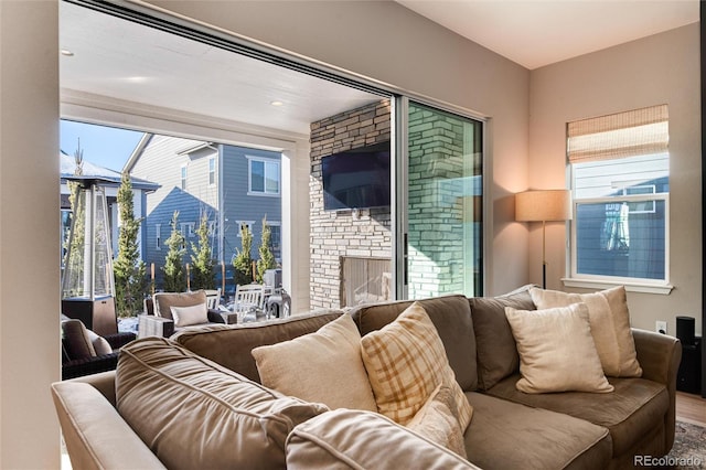 living room featuring a fireplace and hardwood / wood-style flooring