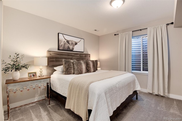 bedroom featuring carpet