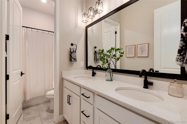 full bathroom featuring shower / bath combination with curtain, toilet, vanity, and tile patterned flooring