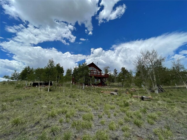 69 Noxibee Ct, Como, CO 80432 - view of yard featuring a wooden deck