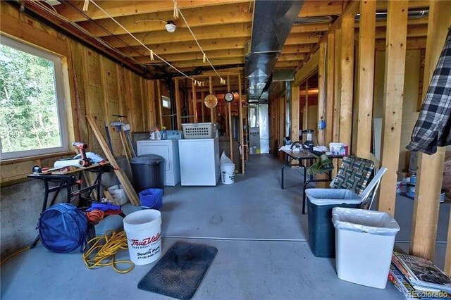 69 Noxibee Ct, Como, CO 80432 - basement featuring washer and clothes dryer