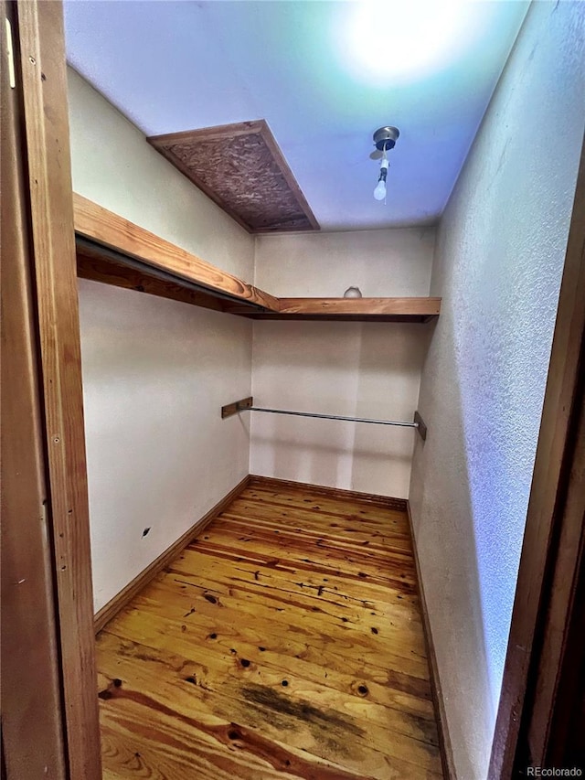 spacious closet with light wood-type flooring