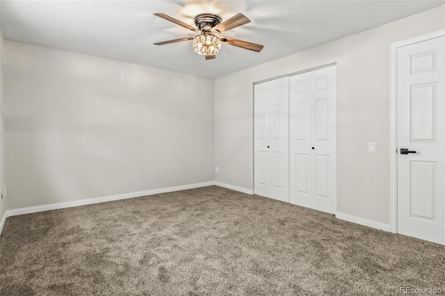 unfurnished bedroom featuring ceiling fan and carpet