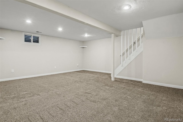 basement with carpet flooring