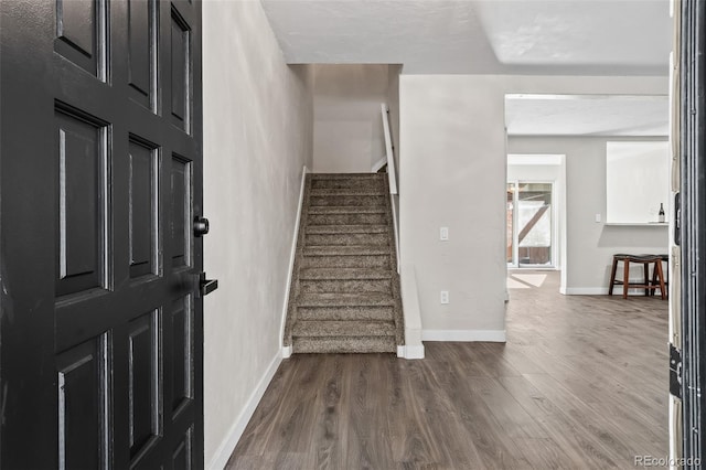 entrance foyer featuring dark hardwood / wood-style flooring