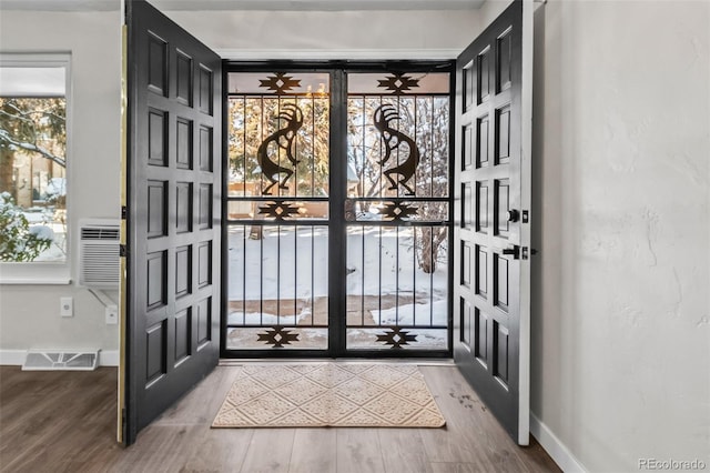 entrance foyer with hardwood / wood-style floors