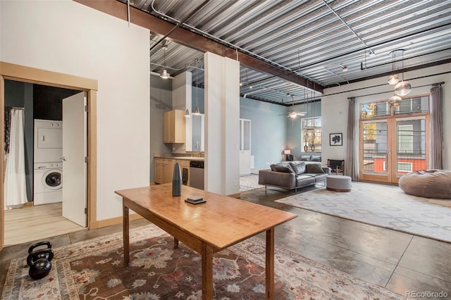 lobby featuring stacked washer and dryer