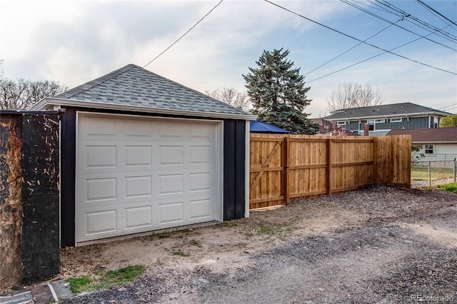 detached garage with fence