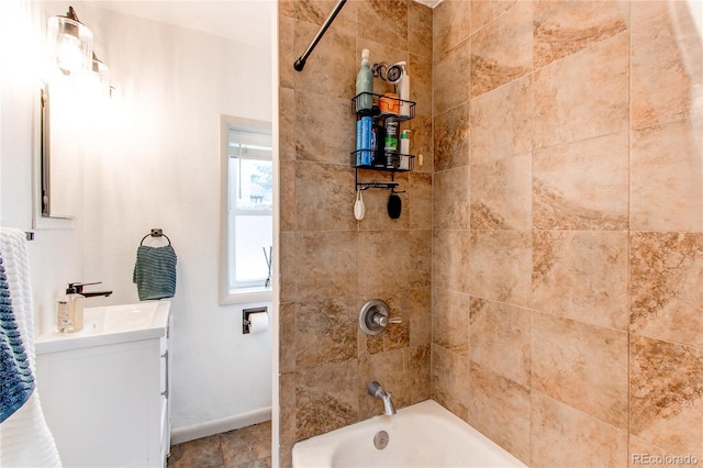 full bathroom with shower / bath combination, baseboards, and vanity