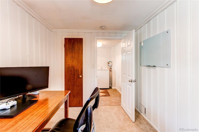 office area featuring crown molding, light colored carpet, washer / dryer, and visible vents