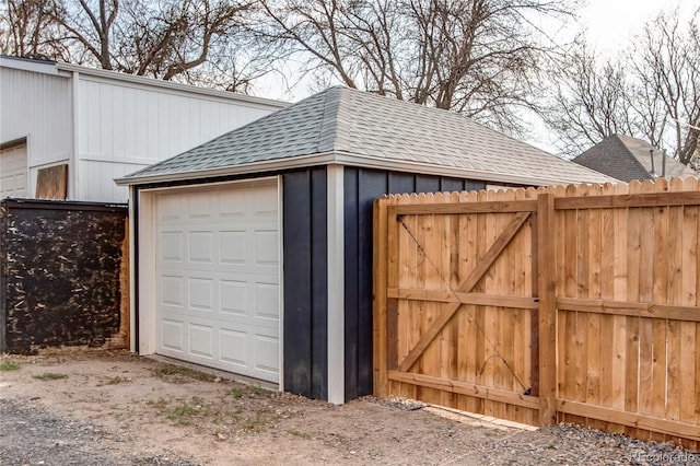 garage with fence