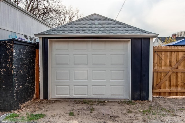 garage featuring fence