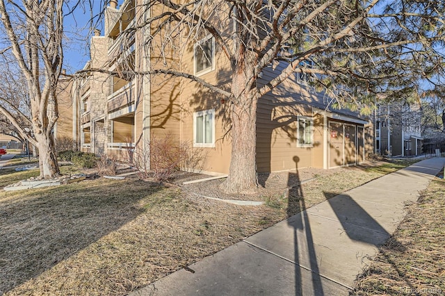 view of side of property featuring a garage